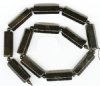 16 inch strand of 31x11mm Six Sided Black Onyx Tubes